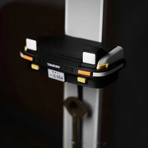 Auto-Schlüsselanhänger mit offenem Scheinwerfer als Dekoration