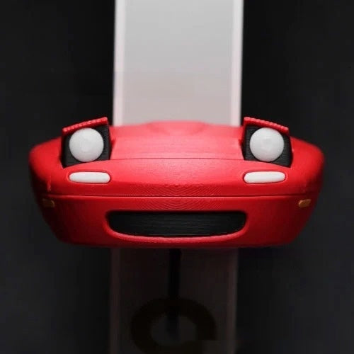 Auto-Schlüsselanhänger mit offenem Scheinwerfer als Dekoration