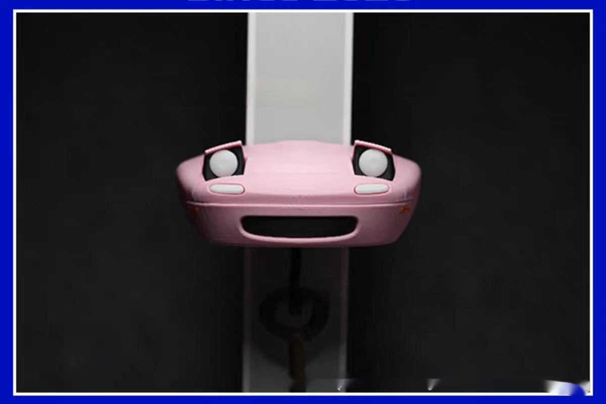 Auto-Schlüsselanhänger mit offenem Scheinwerfer als Dekoration